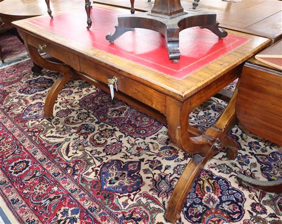 A Victorian walnut writing table in the style of Pugin